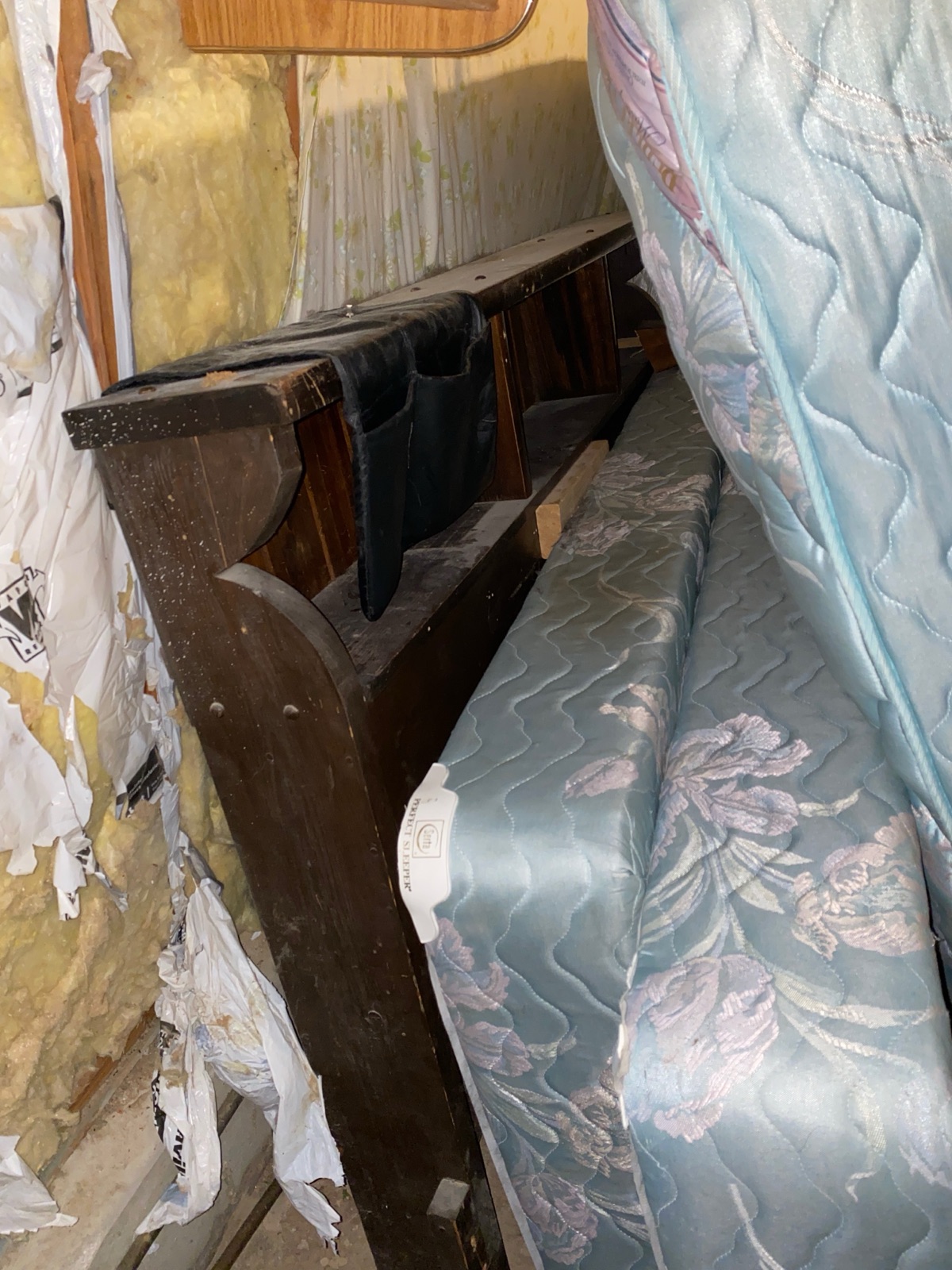Bedroom set and mattresses being cleared out